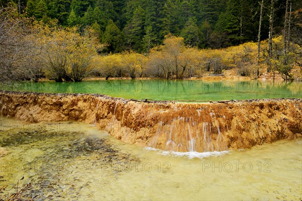 Lime terraces with lakes in autumnal environment