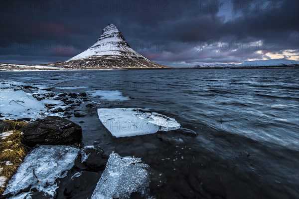 Peak of Kirkjufell with Kirkjufell river