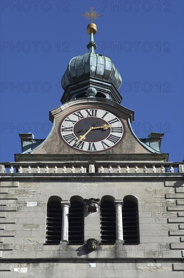 Clock tower of the Basilica of St. Emmeram against blue sky