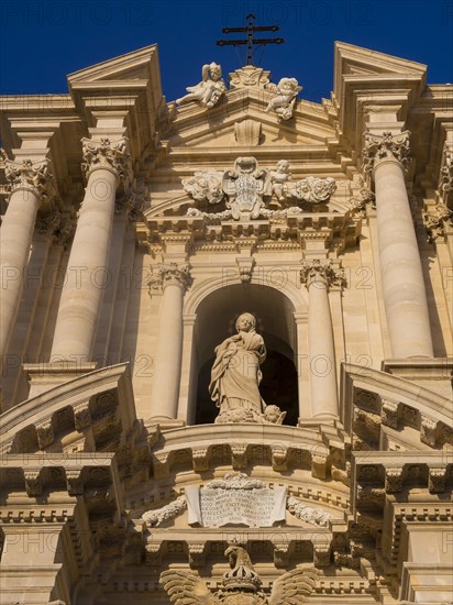 Sculpture in front of the baroque cathedral