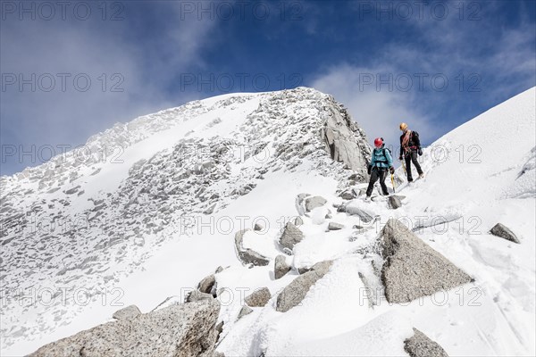 Mountaineers descending from Loffler