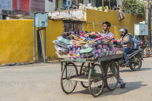 Plastic shoes street seller