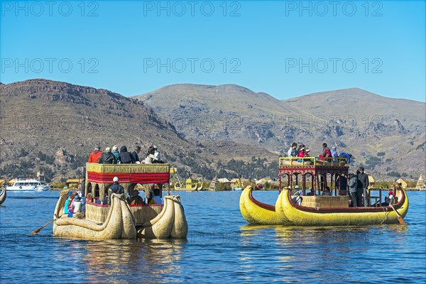 Boats off the floating islands of the Uros on Lake Titicaca