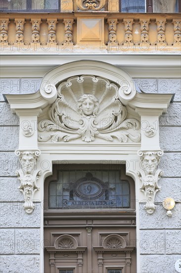 Head of a Woman in a shell above the entrance