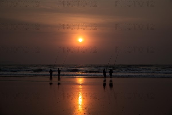 Fishermen at sunrise