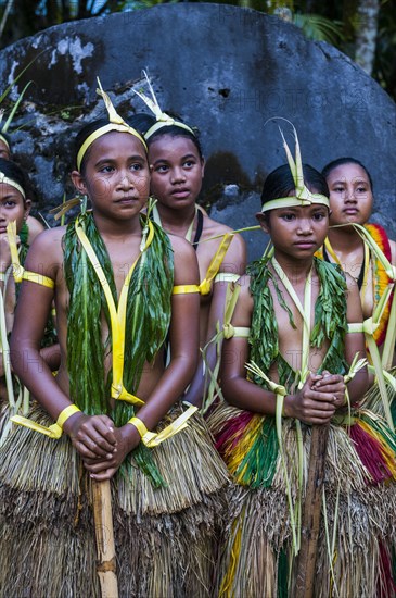 Traditionally dressed islanders