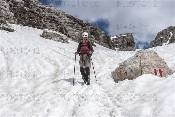 Mountaineer during the descent from the the summit of Mt Cima Pisciadu