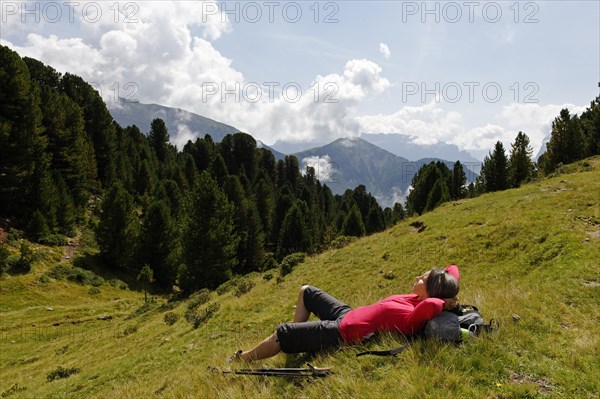 Hiker at the Raschotz or Rasciesa mountain pasture