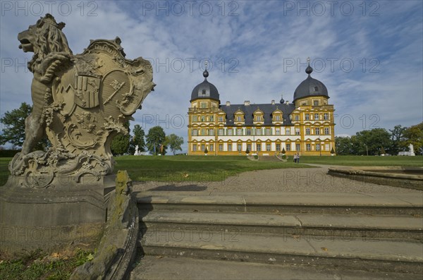 Stone sculptures in front of Schloss Seehof palace