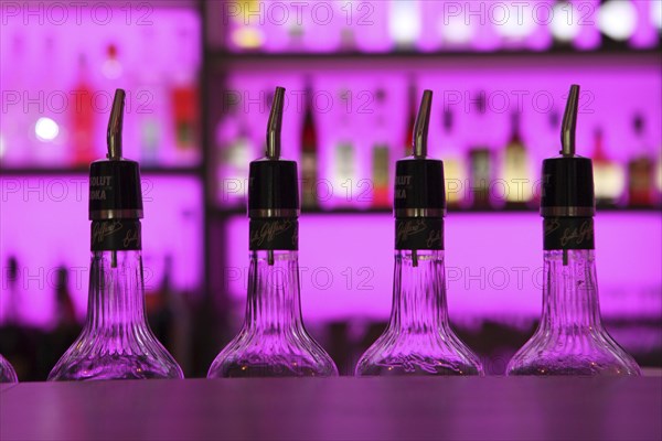 Bottles with liquor at a bar