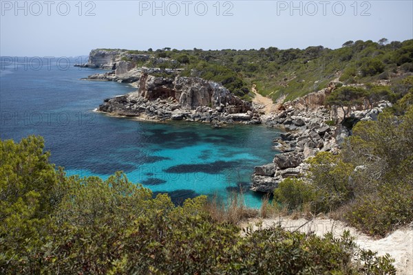 Rock-lined bay of Calo des Moro