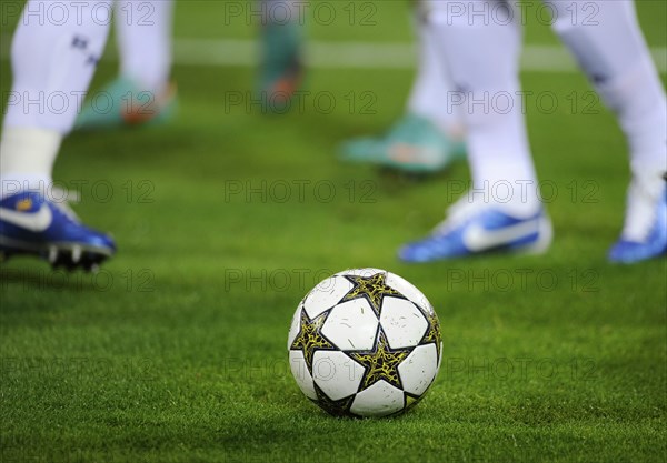 Real Madrid players running after the official match ball