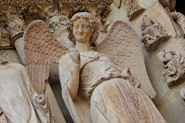 Angel on the left main portal