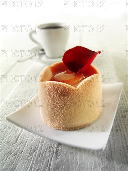 Modern designed white chocolate cake with a sponge case and strawberry filling