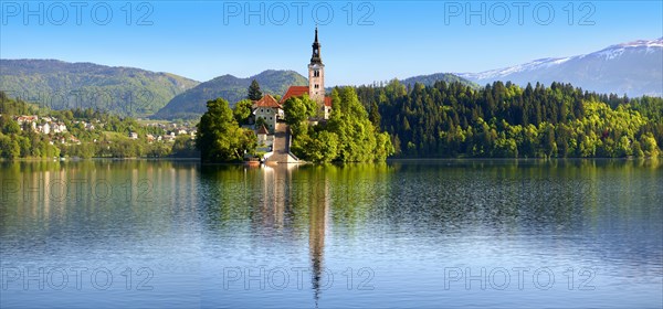 Assumption of Mary Pilgrimage Church in the middle of Lake Bled