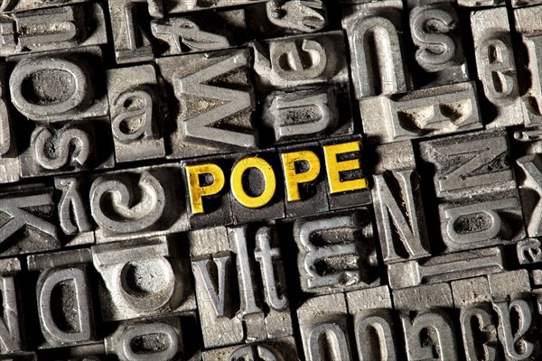 old-lead-letters-forming-the-word-pope-photo12-imagebroker-florian