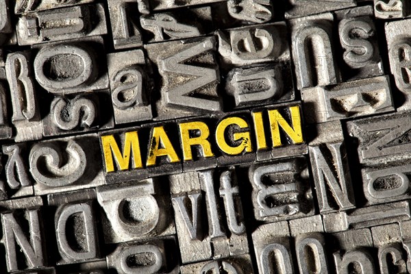 Old lead letters forming the word Margin