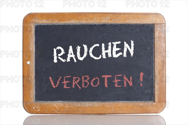 Old school blackboard with the words RAUCHEN VERBOTEN!