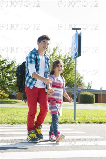 Children crossing a zebra crossing