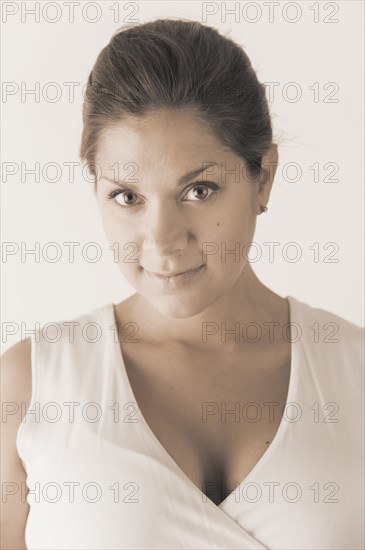 Portrait of woman in a white dress