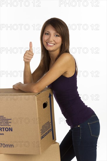 Young woman with moving boxes