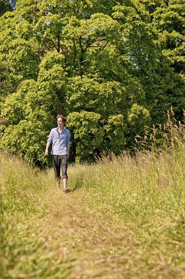 Young man walking in nature