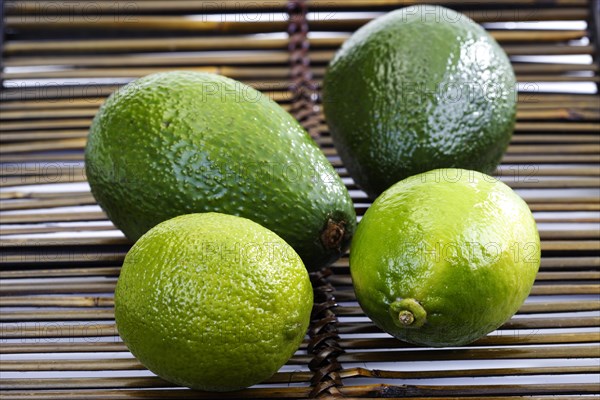 Limes (Citrus x aurantiifolia) and Avocados (Persea americana)