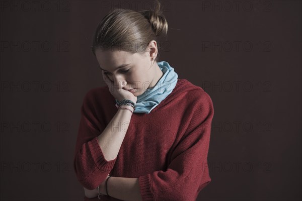 Teenage girl with a thoughtful expression