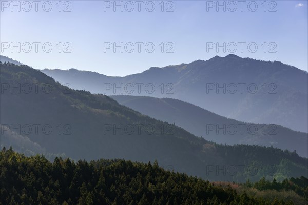 View to wooded mountains at the Nakasendo road