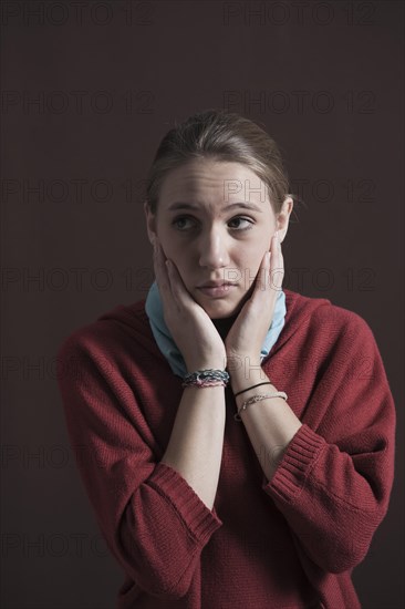 Teenage girl with a thoughtful expression
