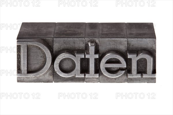 Old lead letters forming the word 'Daten'