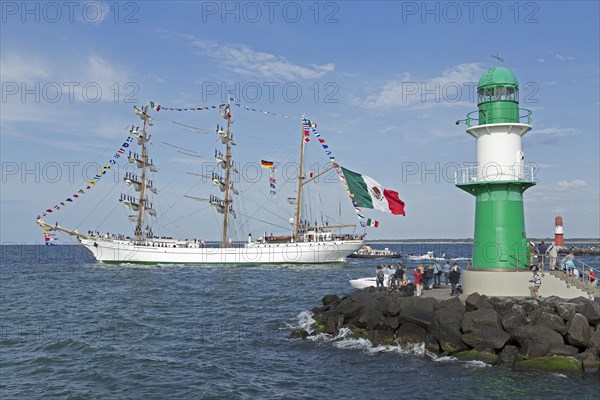 Mexican Bark Cuauhtemoc leaves the Hanse Sail with sailors in the masts