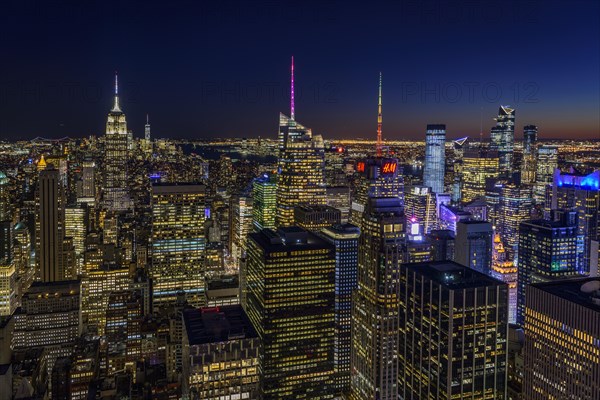 View of Midtown and Downtown Manhattan and Empire State Building from Top of the Rock Observation Center at Night