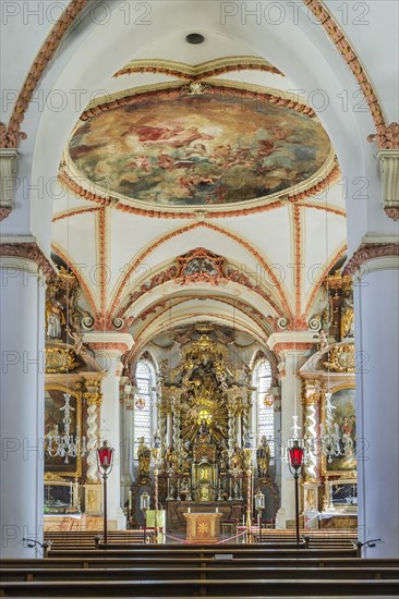 Church nave with main altar and ceiling fresco