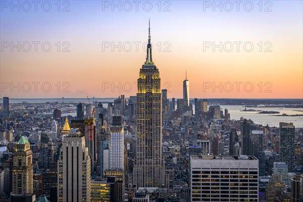 View of Midtown and Downtown Manhattan and Empire State Building from Top of the Rock Observation Center at sunset