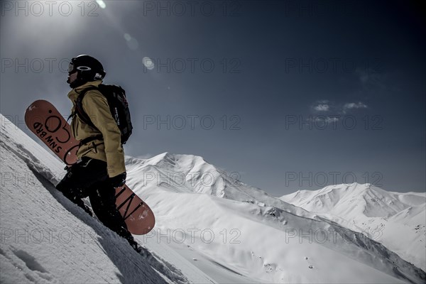 Snowboarder at Heli Snowboarding in the Himalayas