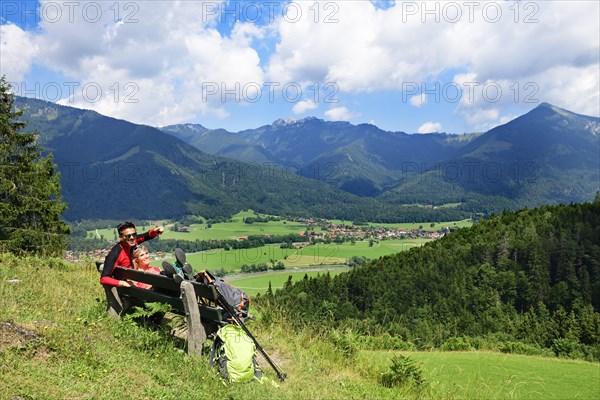 Hikers enjoy the view from alpine restaurant