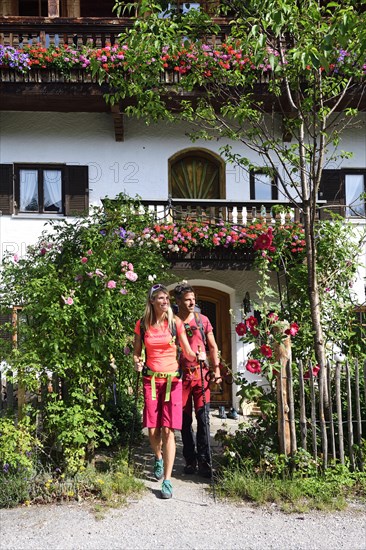 Hikers leave bed and breakfast in Sachrang
