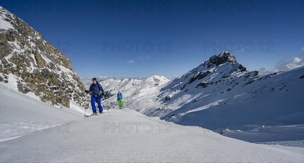 Two ski tourers