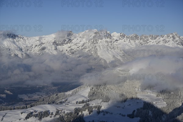 View from the summit of the Hohe Salve to the snowy Wilder Kaiser