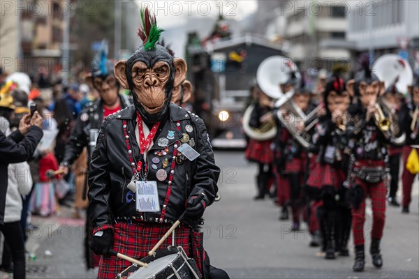 Punky Monkey Guggenmusik Loechlitramper Littau at the carnival procession of the Maettli Guild in Littau