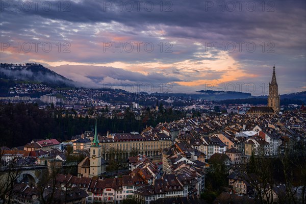 City view at sunrise, view from the rose garden to the old town