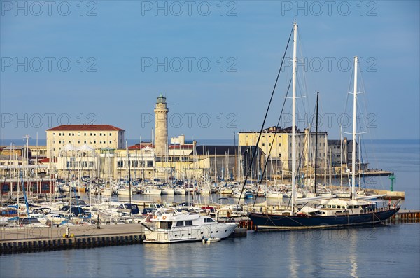 View to Marina San Giusto and the lighthouse La Laterna