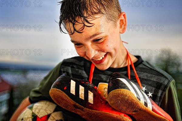 Boy with soccer shoes