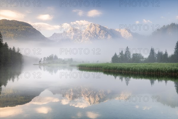 Alpine lake with reflection