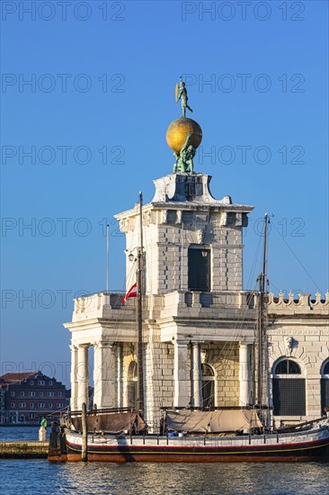 Dogana da Mar in the morning light at the entrance to the Canale Grande