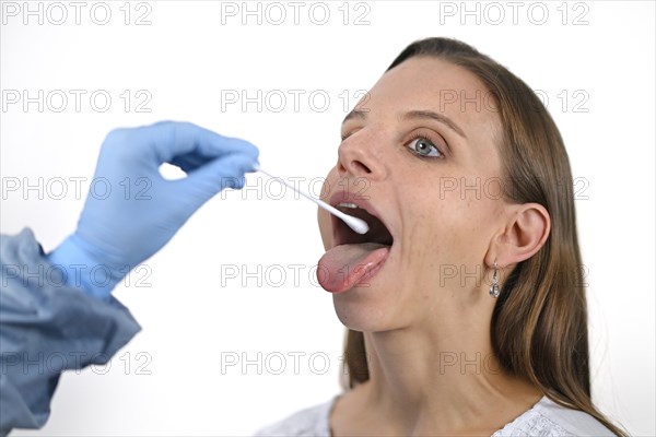 Woman receives throat swab