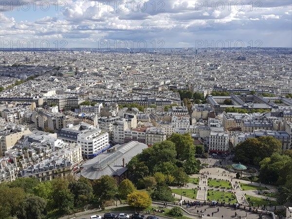 City view of Paris from the Basilica Sacre-Coeur and Louise-Michel-Square