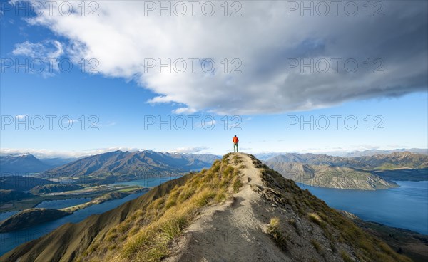 Hiker stands at the summit