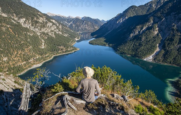 Hiker rests and looks into the distance